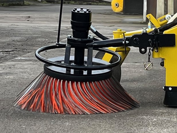 Forklift sweeper floating broom system cleaning uneven industrial ground