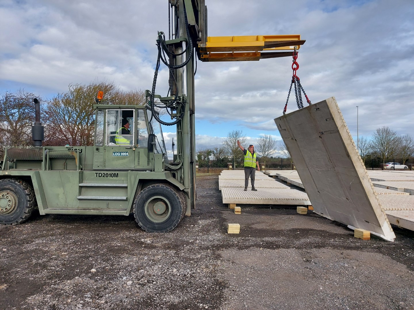 Forklift attachment helping improve warehouse productivity