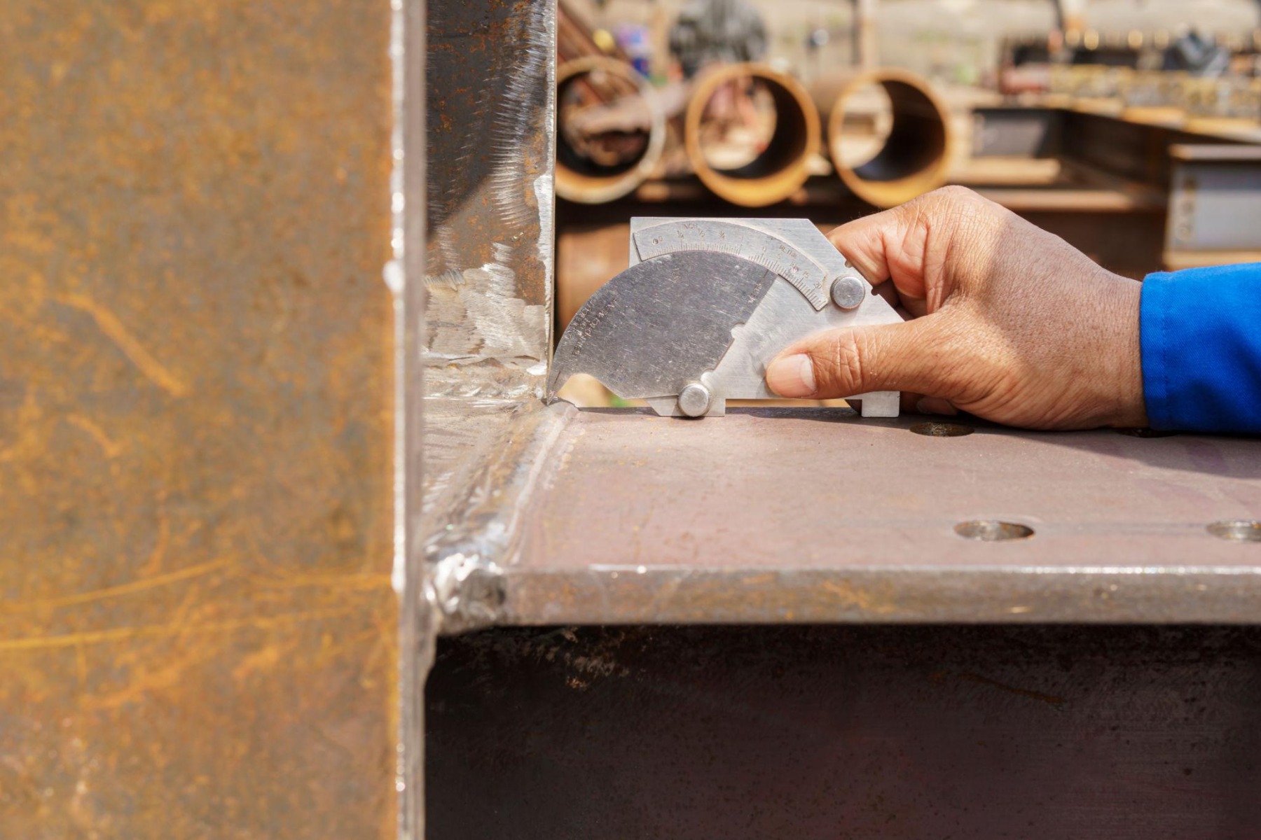 Visual inspection of forklift attachment welds and structural components